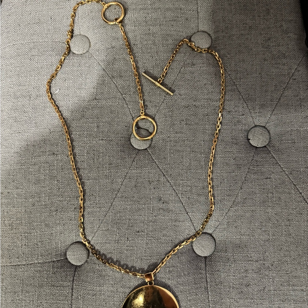 Celine Brass Necklace with Elegant Pendant and Circular Accents